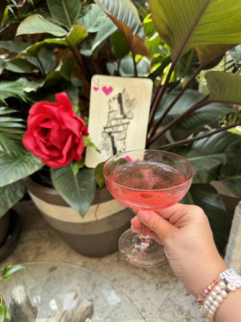 Photo of drink and decor at Mad Hatter Brunch at Isabelle's Coconut Grove