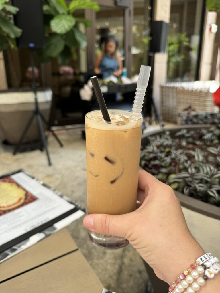 Photo of coffee drink at Mad Hatter Brunch at Isabelle's Coconut Grove